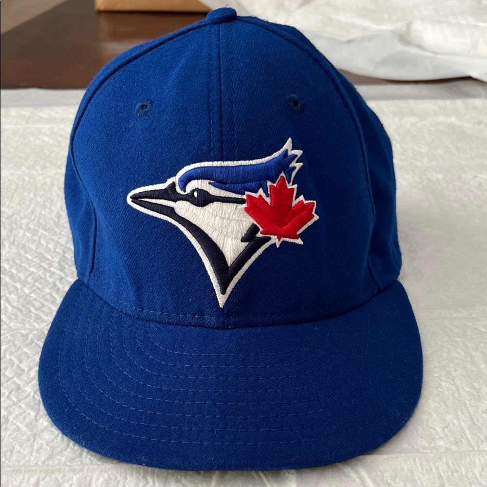 New Era 5950 Toronto Blue Jays Royal Blue Cap with Red Maple Leaf Logo